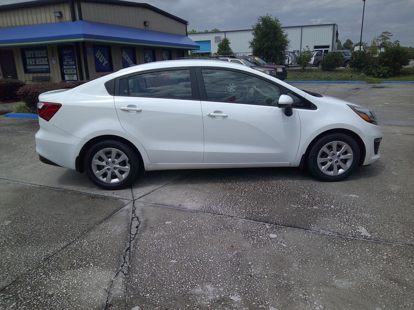 2016 WHITE KIA RIO (KNADM4A39G6) , located at 1200 Cassat Avenue, Jacksonville, FL, 32205, (904) 695-1885, 30.302404, -81.731033 - Photo#2